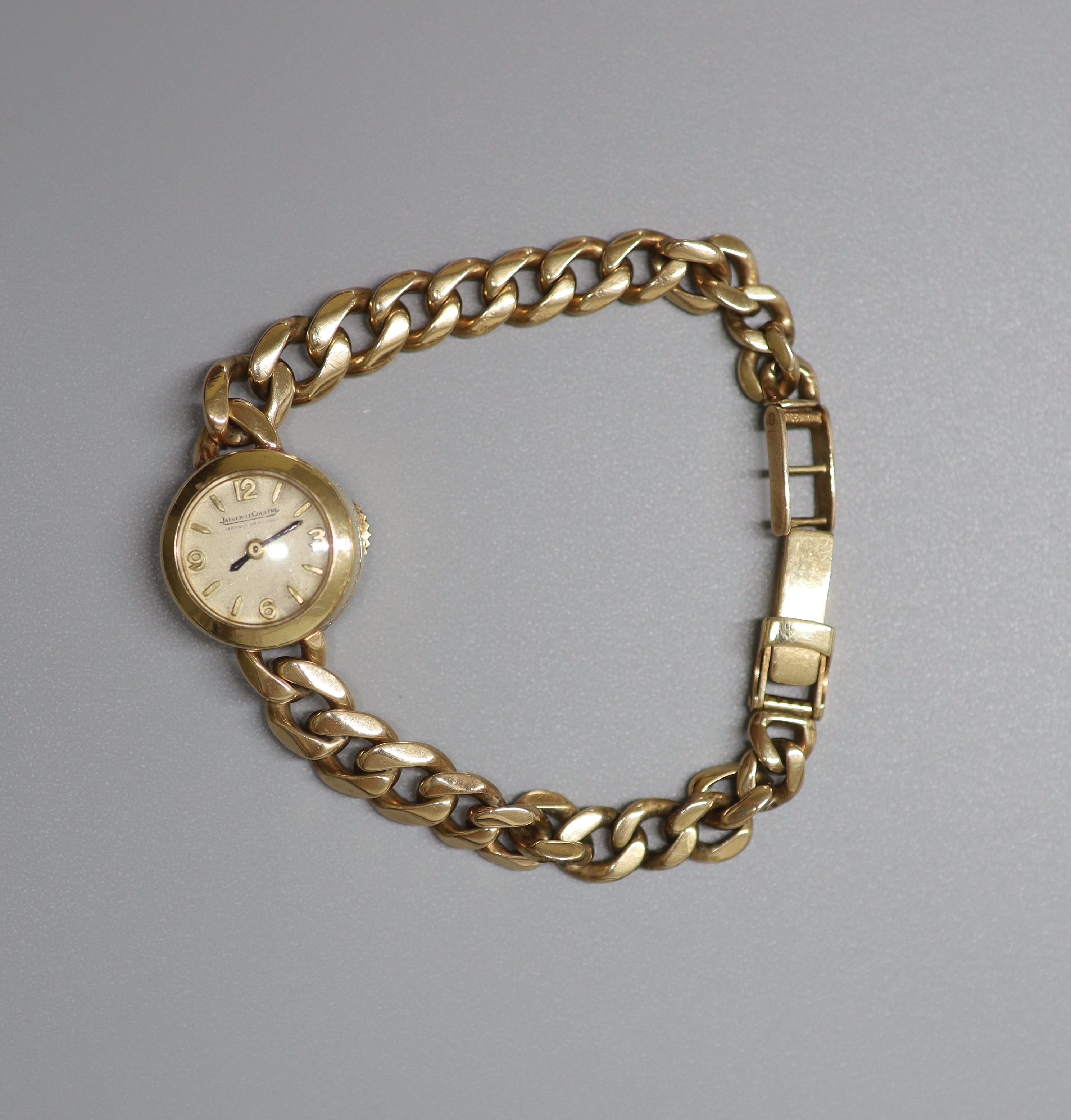 A lady's 1960's 9ct gold Jaeger LeCoultre manual back wind wrist watch, on associated 9ct gold curb link bracelet, overall 16.2cm, gross weight 19.2 grams, with Jager LeCoultre box